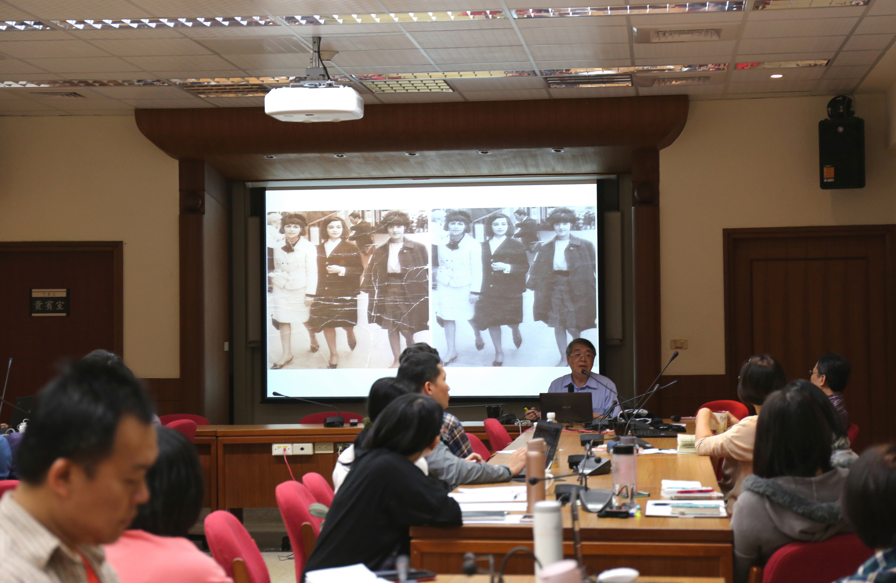 Mark Liao demonstrating why restoring black-and-white images are more difficult than restoring colored ones.