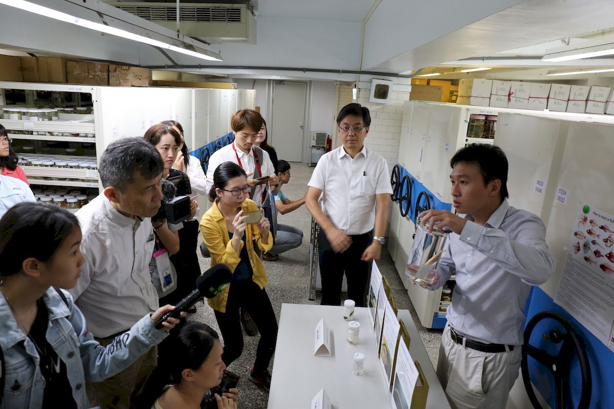 Dr Huang presenting the specimen of an extinct Taiwanese fish.