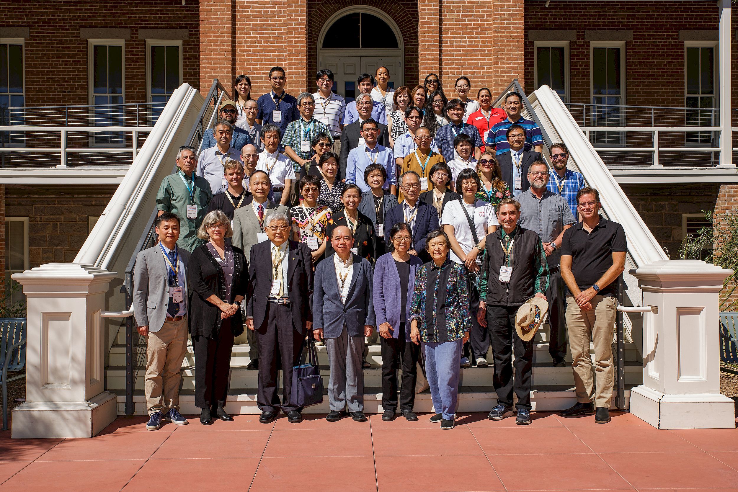 Group photo of participants of the Pacific Neighborhood Consortium 2022 Annual Conference and Joint Meetings (PNC 2022). In the second row, the third person from the left is Hsi-yuan Chen, CEO of PNC and Director of Academia Sinica Center for Digital Cultures, the fourth person is Shu-jiun Chen, PNC 2022 Technical Program Co-Chair and Executive Secretary of Academia Sinica Center for Digital Cultures, and the sixth person is Jieh Hsiang, PNC 2022 Poster Judge Committee and Director of Research Center for Digital Humanities of National Taiwan University. In the front row, starting from left to right, the first person is Jiang Wu, Director of the Center for Buddhist Studies of the University of Arizona, the second person is Kimberly A. Jones, Vice Dean for Academic Affairs in the College of Humanities of the University of Arizona, the third person from the left is Chang-Hung Chou, Academician of Academia Sinica, and the fourth person is Pao-Kuan Wang, Academician of Academia Sinica, who is also the keynote speaker of PNC 2022 (Photo credit: Academia Sinica).