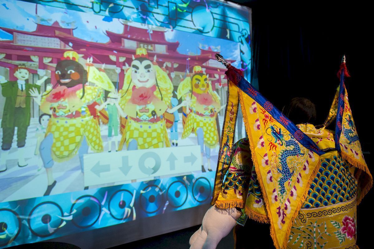 「神之鄉」展區讓民眾體驗臺灣傳統祭典陣頭表演的趣味。